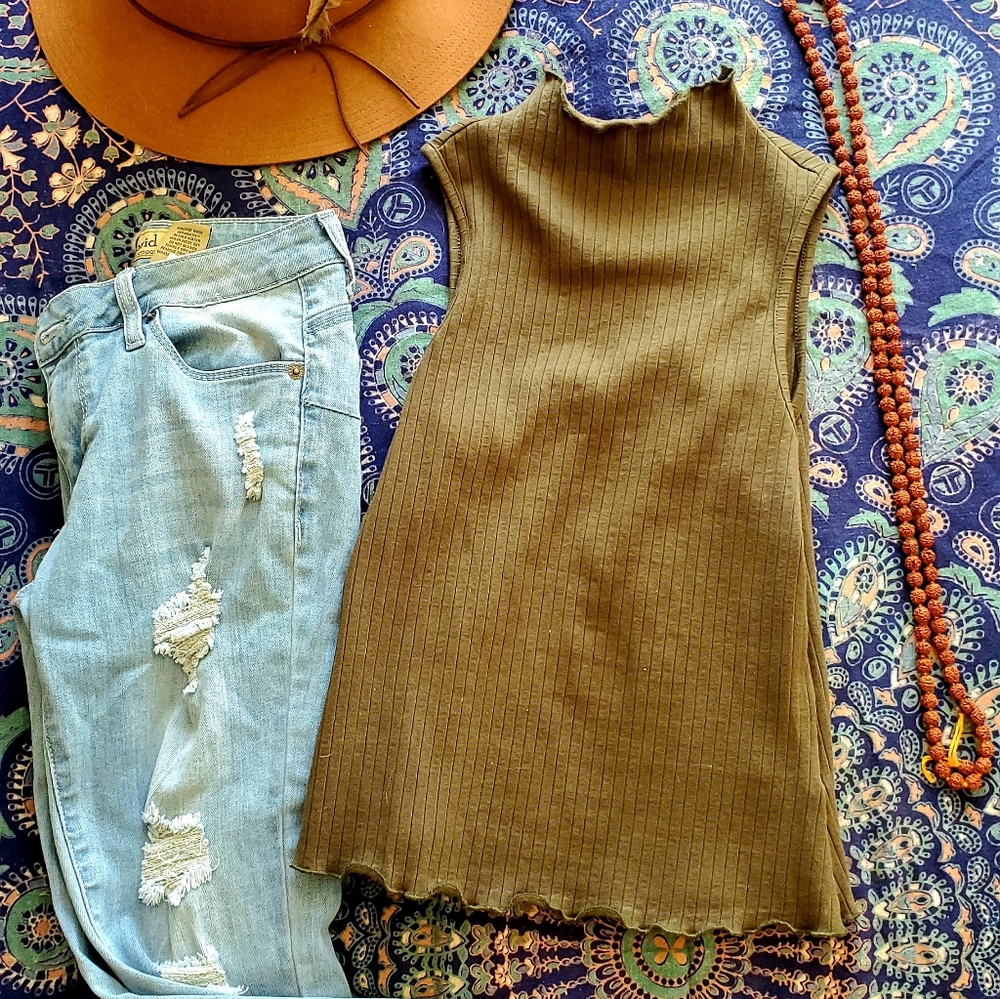 Green sleeveless mock turtleneck top
